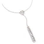 A silver Y-necklace featuring a delicate chain with a small Kanji cahracter charm symbolizing the word 