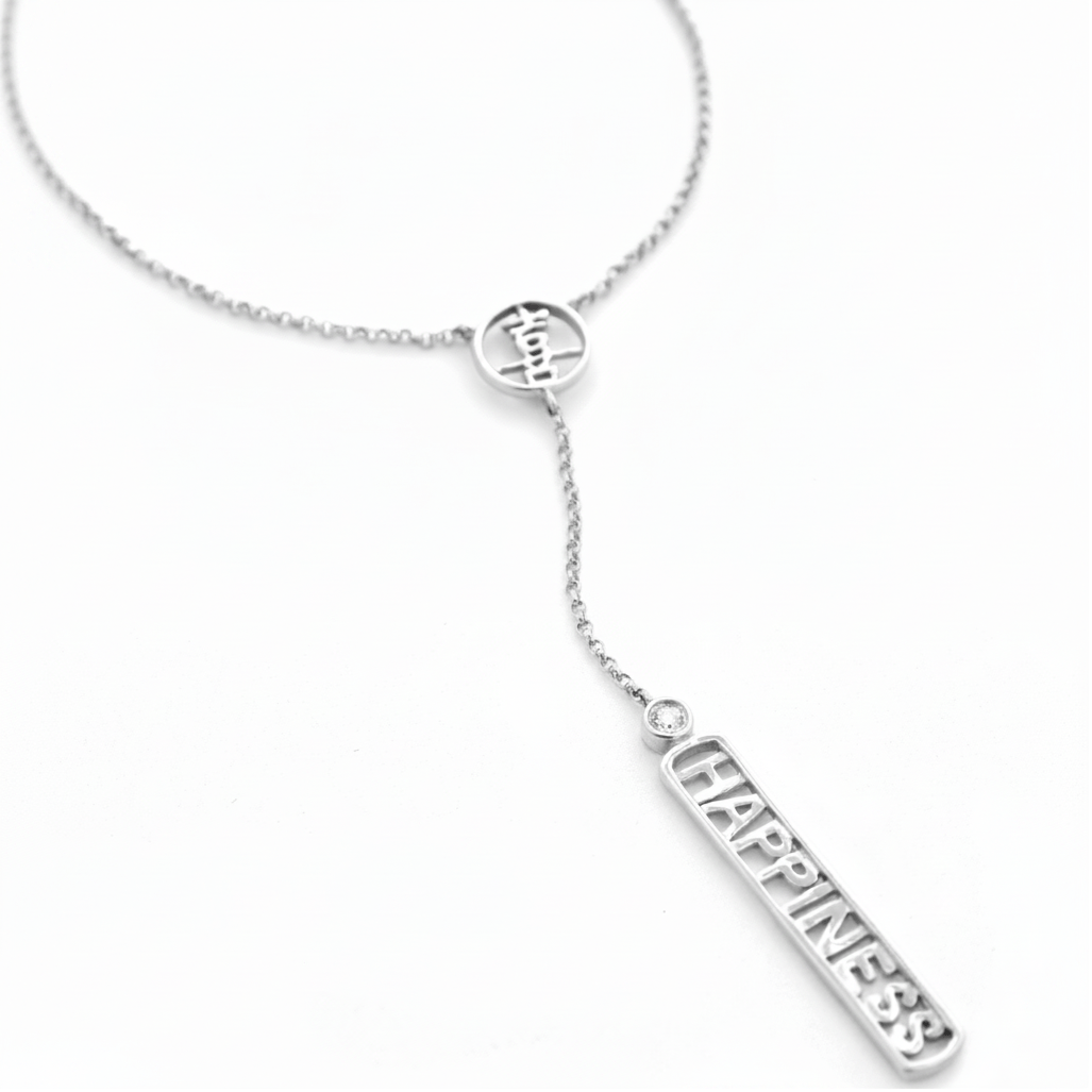 A sterling silver Y-necklace featuring a small circular pendant with a Kanji character for the word 